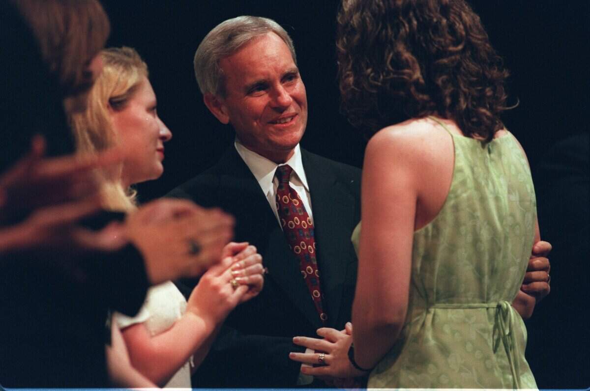 Robert Watkins is seen here at an award ceremony in 1998. Watkins, who retired as superintendent of Independence schools in 1999, was named this week as Harrisonville's interim superintendent while the current superintendent, Frank Dahman, remains on leave.