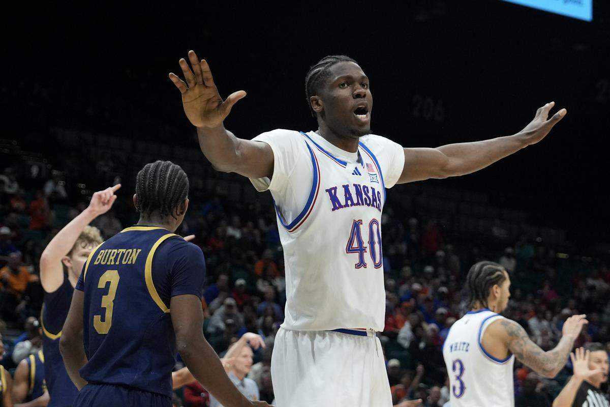 Flory Bidunga #40 of the Kansas Jayhawks reacts to a foul against the Notre Dame Fighting Irish in the second half of their game during the Players Era Championship basketball tournament at Grand Garden Arena on November 24, 2025 in Las Vegas, Nevada.