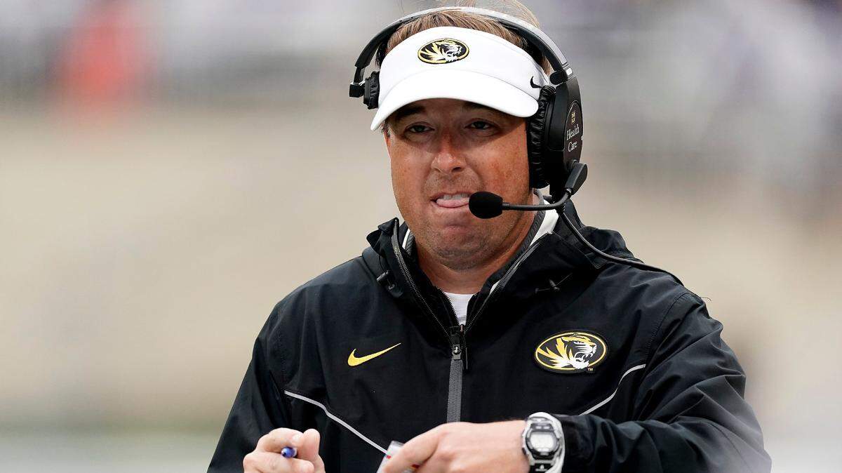 Missouri head coach Eliah Drinkwitz watches during the first half of an NCAA college football game against Kansas State Saturday, Sept. 10, 2022, in Manhattan, Kan. (AP Photo/Charlie Riedel)