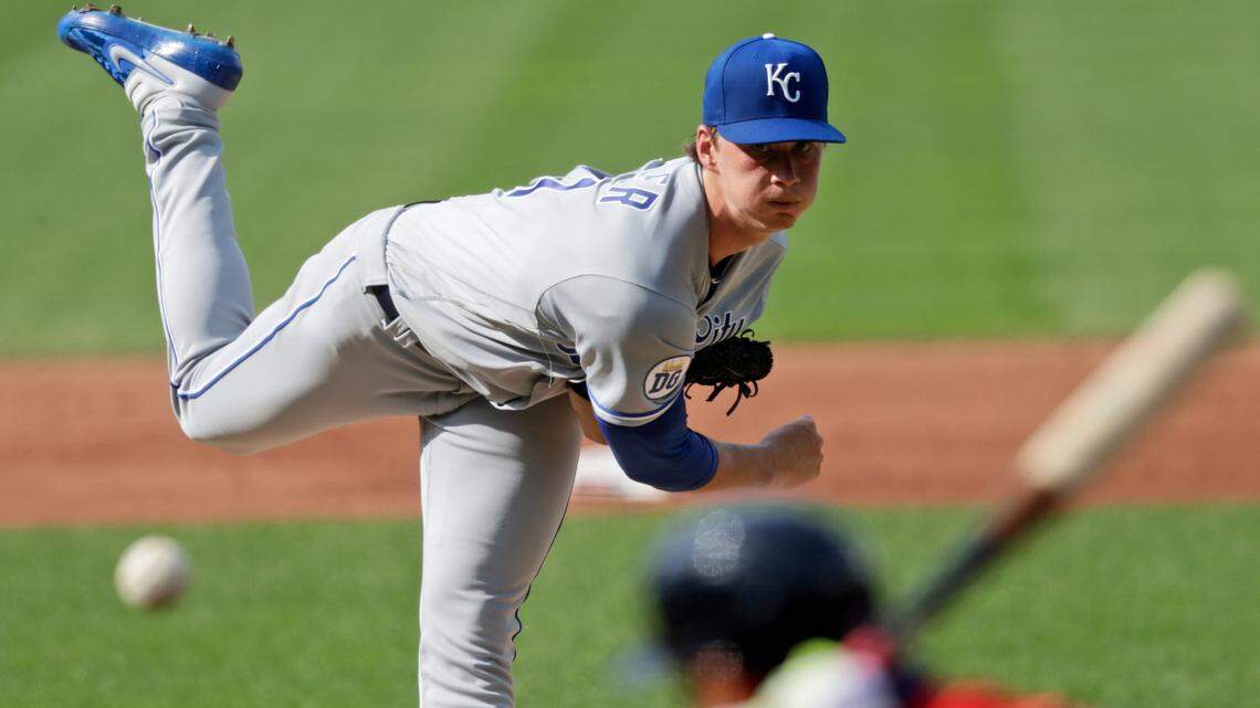 Kansas City Royals starting pitcher Brady Singer delivers to Cleveland Indians’ Cesar Hernandez in the first inning in a baseball game Saturday, July 25, 2020, in Cleveland. (AP Photo/Tony Dejak)