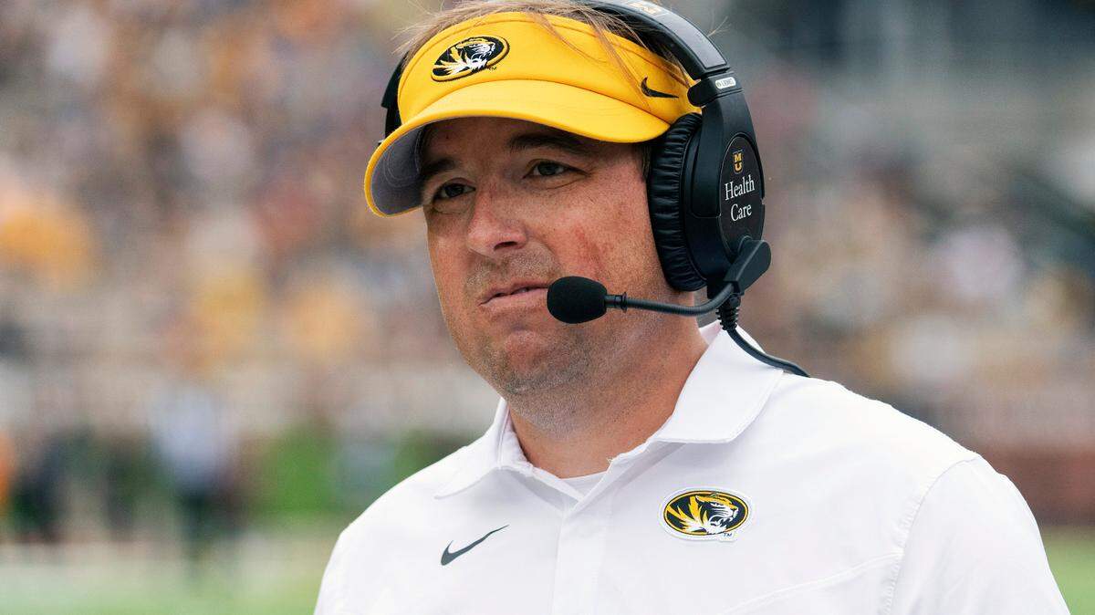 Missouri head coach Eliah Drinkwitz grimaces as he walks the sideline during the first half of an NCAA college football game against Tennessee Saturday, Oct. 2, 2021, in Columbia, Mo. (AP Photo/L.G. Patterson)