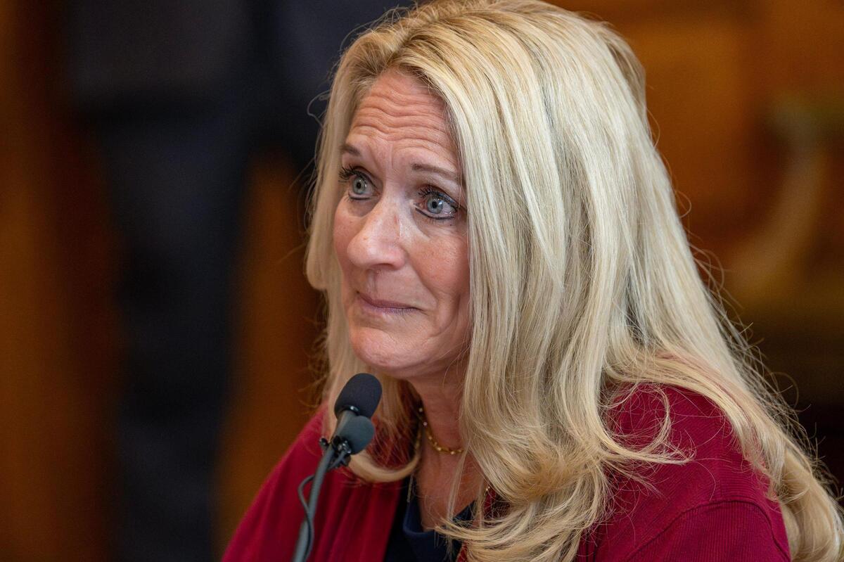 Tammy Woods, of Kalamazoo, Michigan, holds back tears while testifying during a hearing for Senate Bills 589 and 590 on Wednesday, March 26, 2025, in Jefferson City. The proposed legislation would aim to remove the statute of limitations for child sexual abuse lawsuits and prohibit the use of non-disclosure agreements in related settlements.