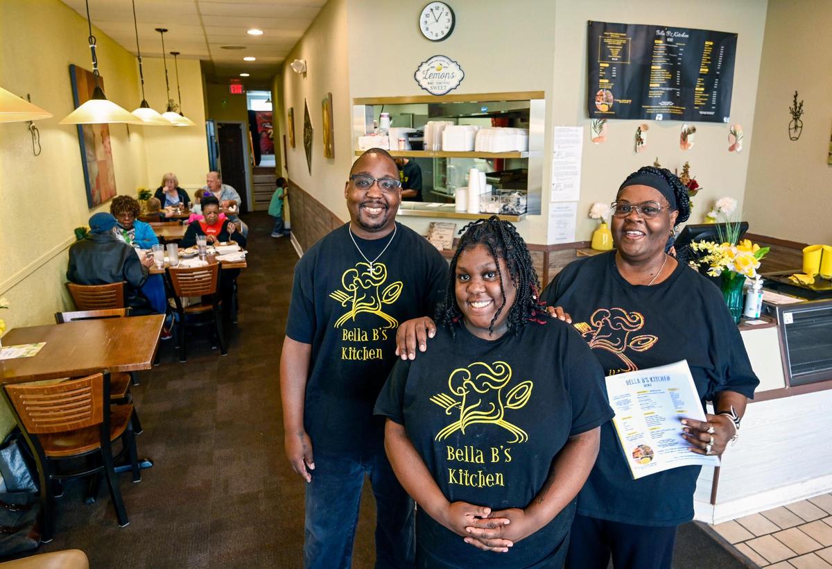 Owners Demonte Rochester, left, and his fiancee Belinda ‘Bella’ Langford, right, and her daughter La’Mia Langford have opened Bella B’s Kitchen in Raytown. La’Mia, who is a sophomore at nearby Raytown High School, hopes to become a chef and run the restaurant in a few years.