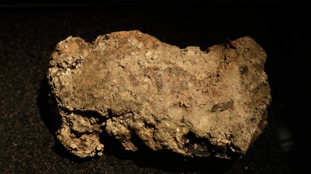The only remaining piece of the 130 ton, 250 meter long fatberg, removed from the sewers in the Whitechapel area of east London in the latter months of 2017, is displayed during a media preview at the Museum of London in London, Thursday, Feb. 8, 2018.