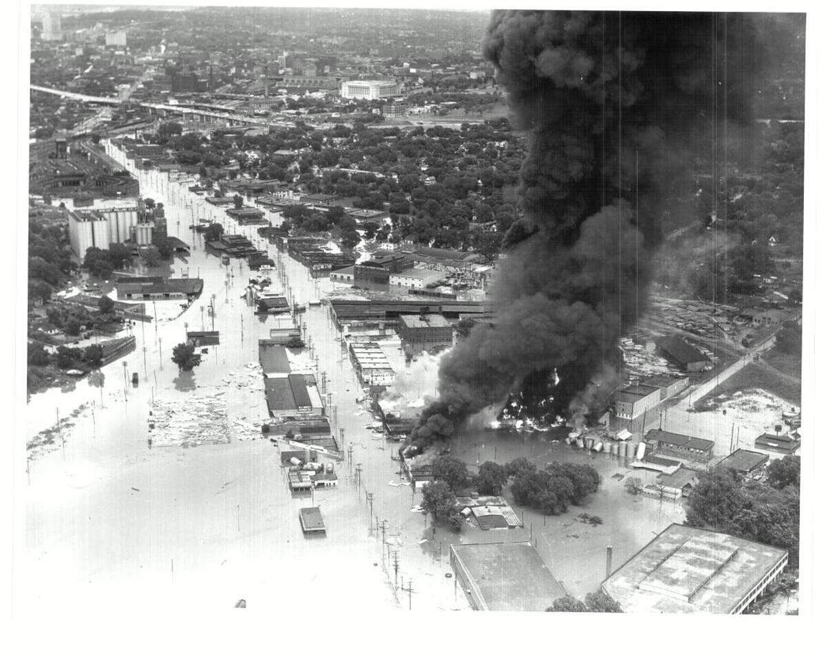 Aerial view of Southwest Boulevard just east of the Kansas-Missouri Border, showing water and fire damage during the 1951 flood.