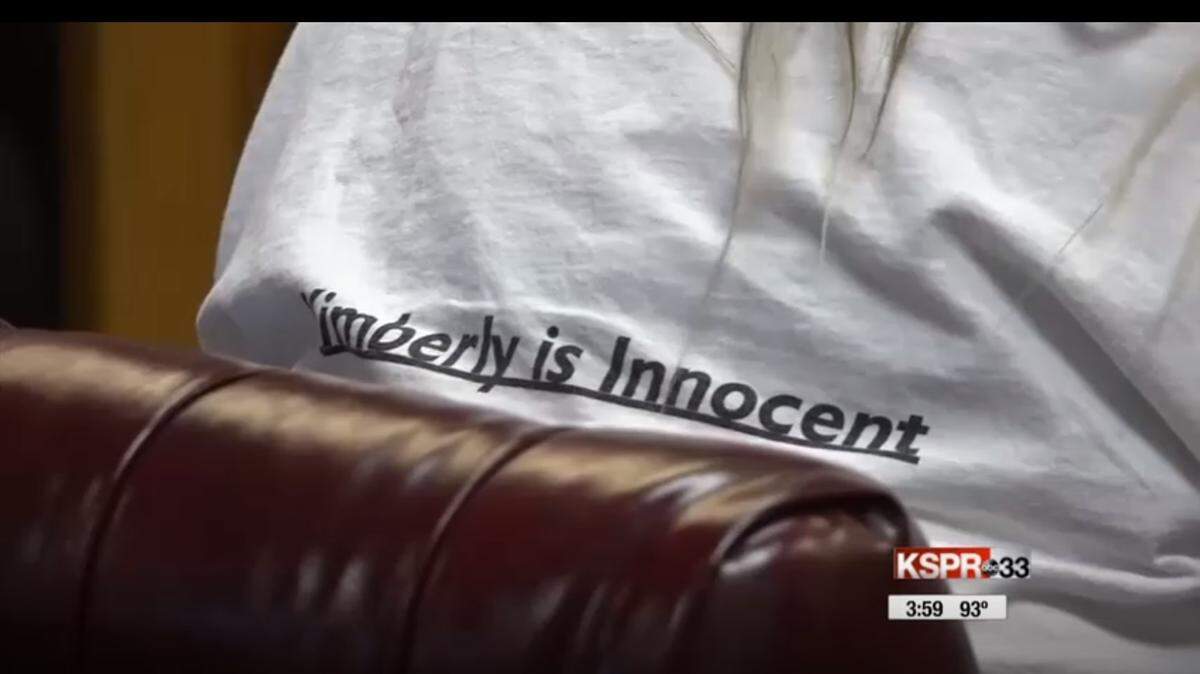 Video captured by KY3 in the courtroom Friday, June 29, 2018, showed Kimberly Lightwine wearing a T-shirt proclaiming her innocence in the death of her 19-year-old son despite her pleading guilty in May to charges of involuntary manslaughter and elder abuse.