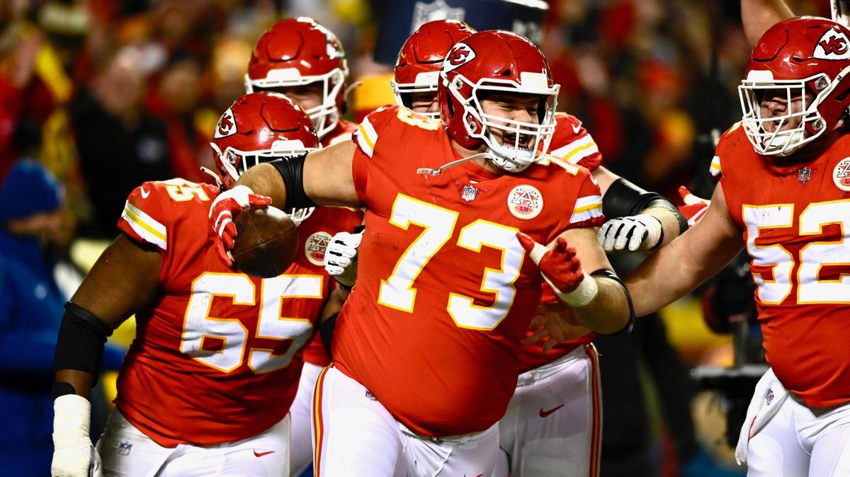 Kansas City Chiefs guard Nick Allegretti celebrates with teammates after catching a pass for a touchdown against the Pittsburgh Steelers in the third quarter Sunday, January 16, 2022, at Arrowhead Stadium.