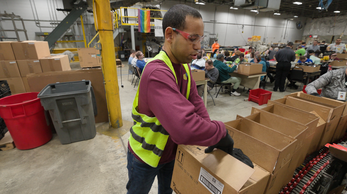 Marshall Krueger, who has developmental disabilities, works at a Missouri business. Missouri ballot measures cap property taxes but freeze budgets, risking services for vulnerable people.