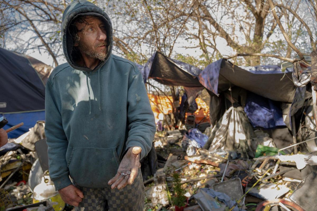 Tommy speaks with Nick Allen, the street outreach coordinator for the Office of Unhoused Solutions, about soon receiving an apartment after living homeless and outdoors for four years.