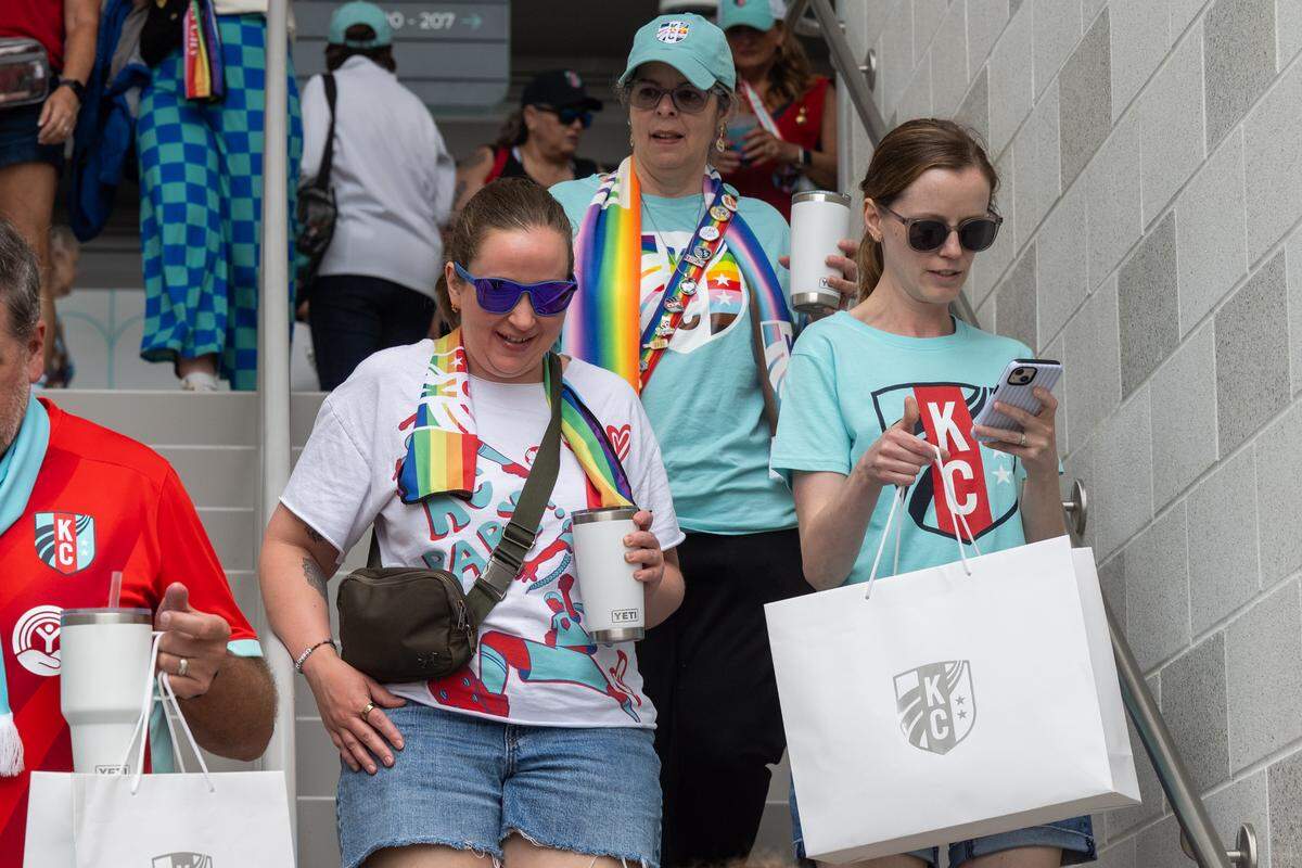 Fans wear pride gear during the KC Current’s 1-0 victory over the Boston Legacy on Saturday, May 30, 2026 at CPKC Stadium in Kansas City.