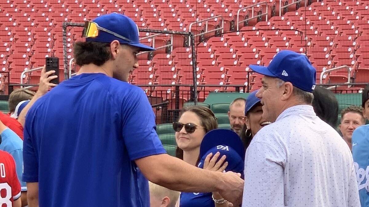 Kansas City Royals outfielder Jac Caglianone greets his father, Jeff, ahead of making his major-league debut on June 3, 2025, at Busch Stadium in St. Louis.