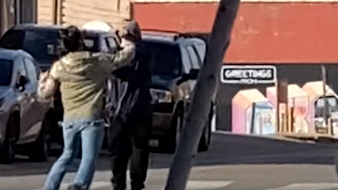 Police say the suspect apparently became upset because the 67-year-old was walking in the street.