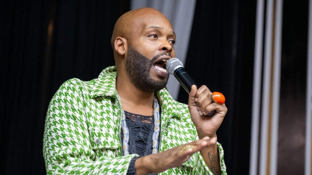 Marquez Beasley serves as MC for Soul Sessions, the longest running open mic night in Kansas City, at Elevation Grille in Raytown. Beasley gives out the rules for the event, keeps the energy high, and introduces each performer.