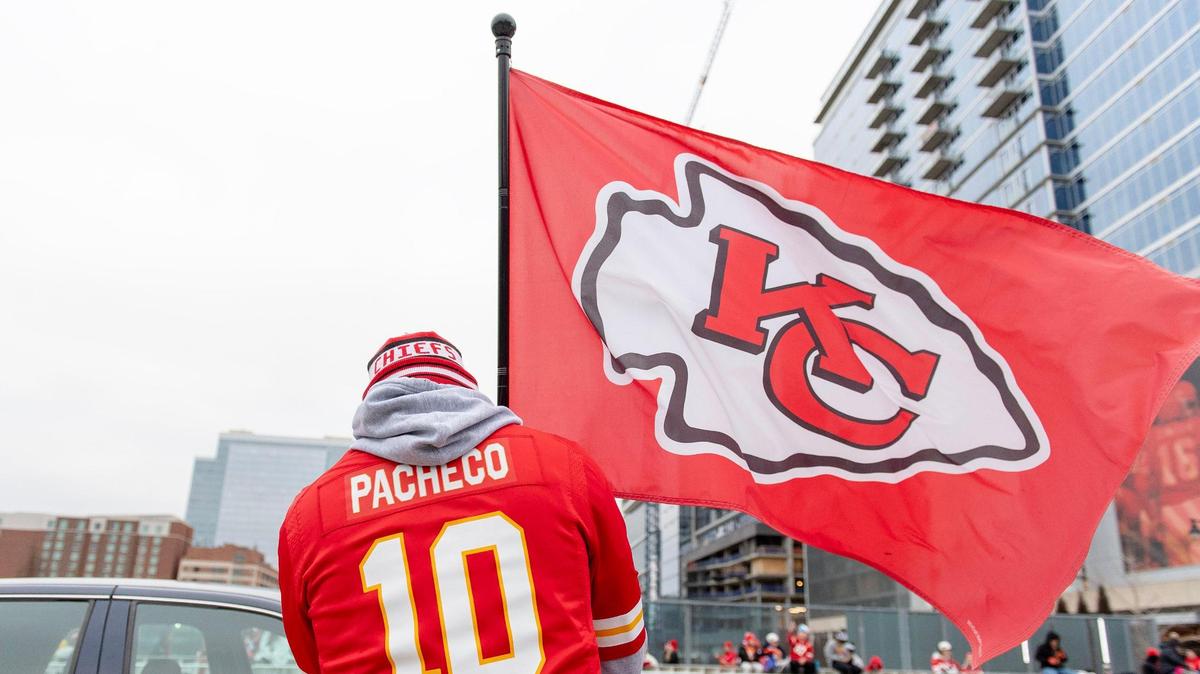 Brad Cunningham of St. Louis flies a Chiefs flag before the Kansas City Chiefs Super Bowl victory parade on Wednesday, Feb. 15, 2023, in Kansas City.