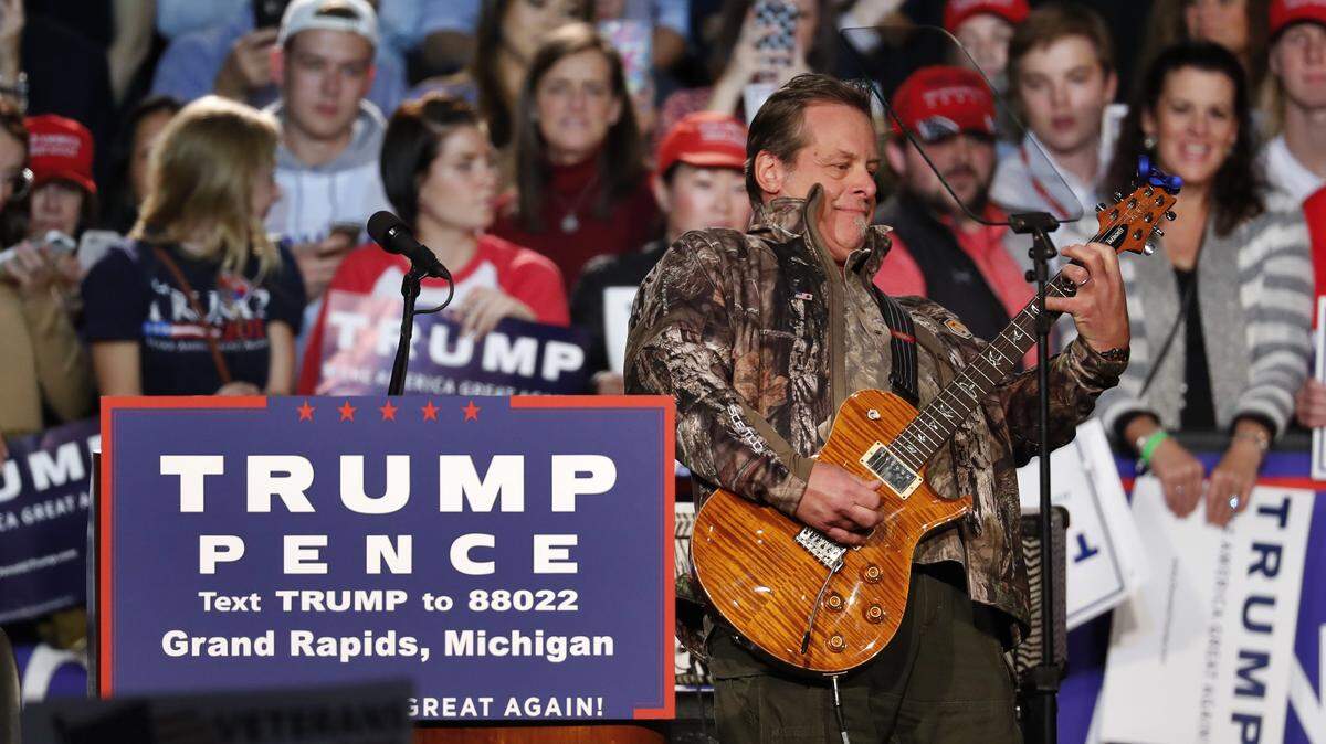Musician Ted Nugent performs at a campaign rally for Republican presidential candidate Donald Trump in Grand Rapids, Mich., Monday, Nov. 7, 2016.