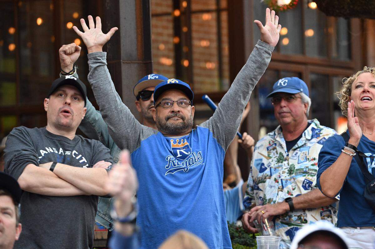 Kansas City Royals fans celebrated after the Royals got out of the 7th inning with the Baltimore Orioles in Game 2 of the AL Wild Card playoffs. The fans were following the game at a watch party at KC Live! at the Power & Light District on Wednesday, Oct. 2, 2024.