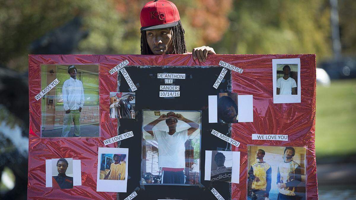 In 2016, Durron Bailey, whose cousin was murdered, attended a rally encouraging witnesses to step forward to help solve crimes.