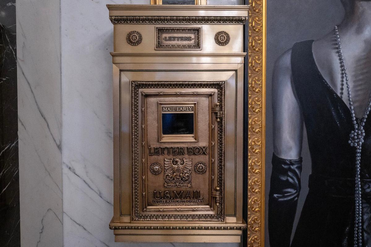 An original mailbox is displayed in the lobby at the Midland Lofts.