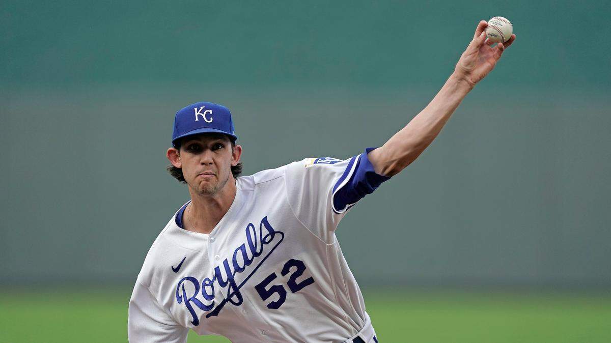 Kansas City Royals starting pitcher Daniel Lynch throws during the first inning of a baseball game against the San Diego Padres Saturday, Aug. 27, 2022, in Kansas City, Mo. (AP Photo/Charlie Riedel)
