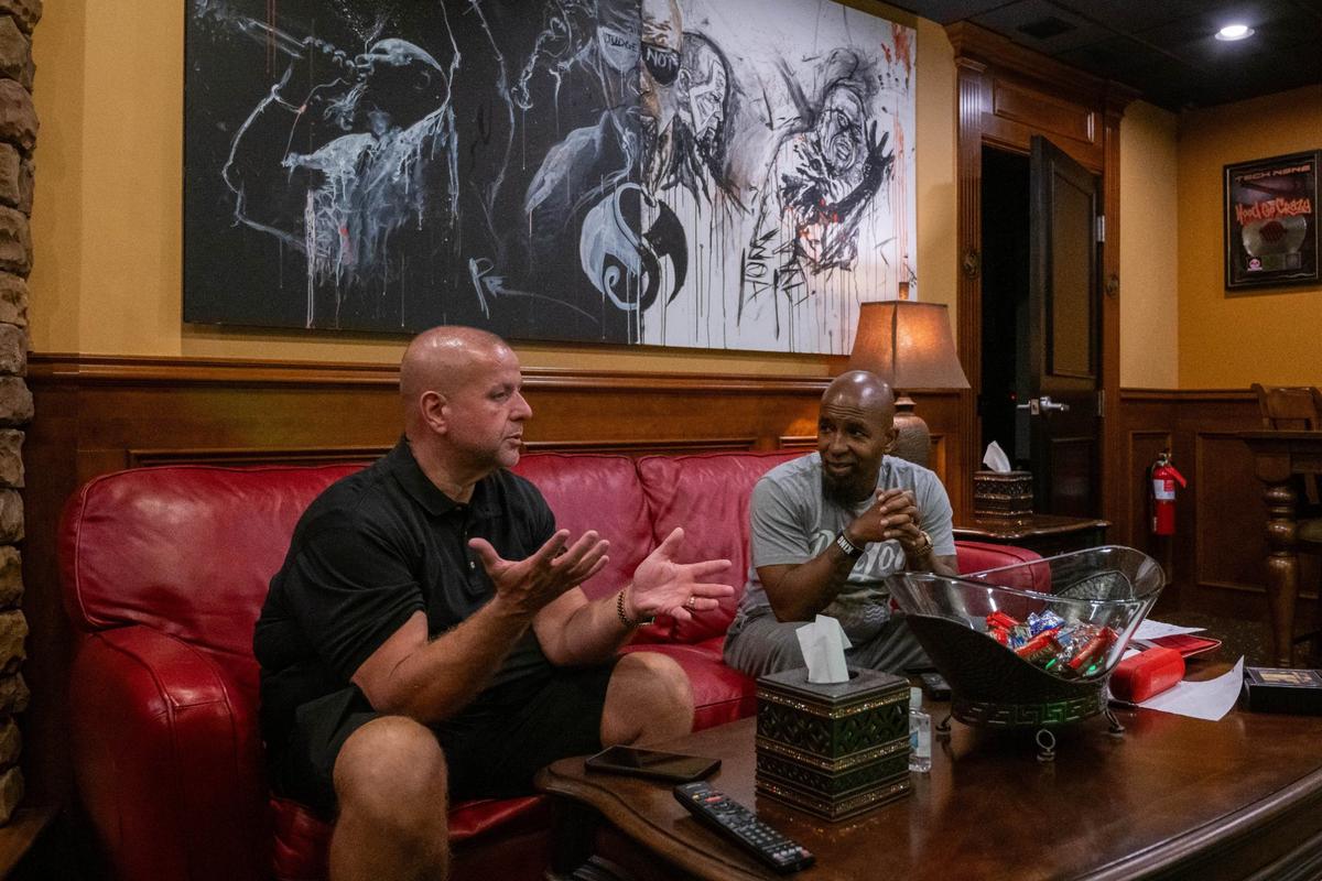 Travis O’Guin, president and co-founder of Strange Music talks with his partner, co-founder and recording artist Tech N9ne just outside one of the recording studios at Strange Land Recording Studios. O’Guin and Tech N9ne founded Strange Music in 2000 and are responsible for Strange Music being one of the most successful independent record labels of all time.
