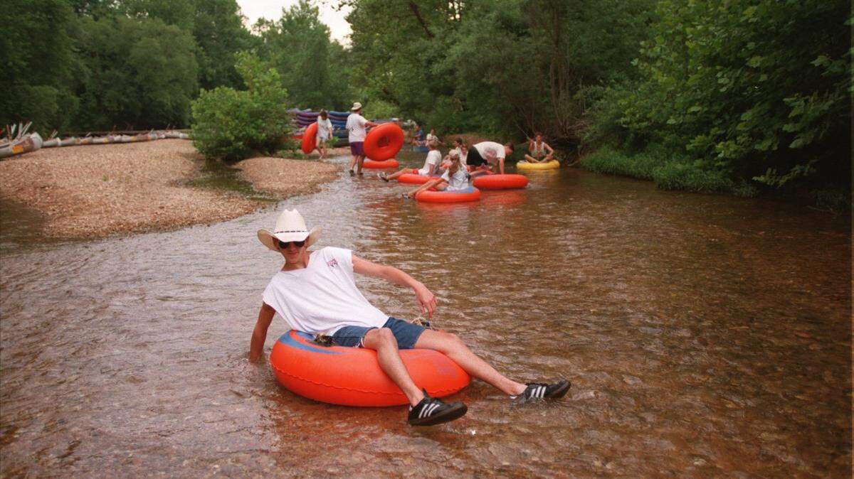 People float down Courtois Creek in Missouri.