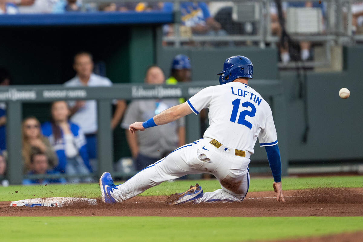 Royals second baseman Nick Loftin slides into third base ahead of the tag during the Royals’ 14-6 win against the St. Louis Cardinals at Kauffman Stadium in Kansas City on Thursday, June 18, 2026.