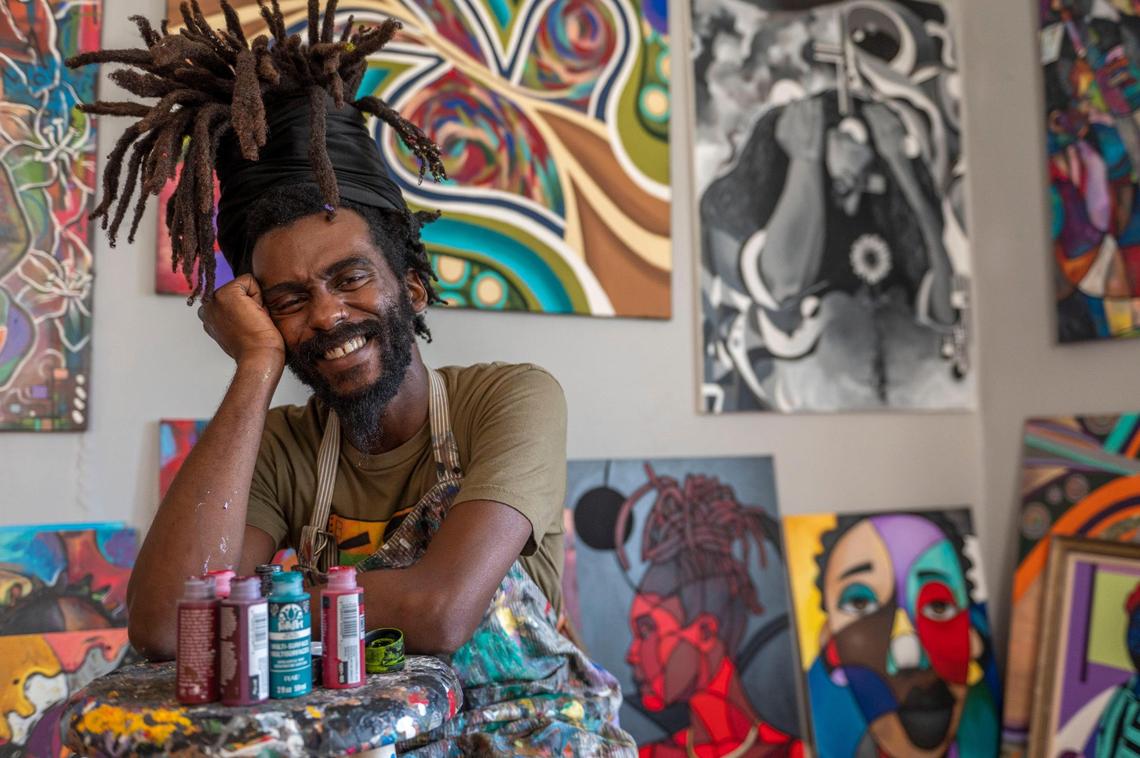 Warren Harvey displays many of his paintings at his Kansas City art studio. One of his paintings appears on “Bel-Air,” which streams on Peacock.