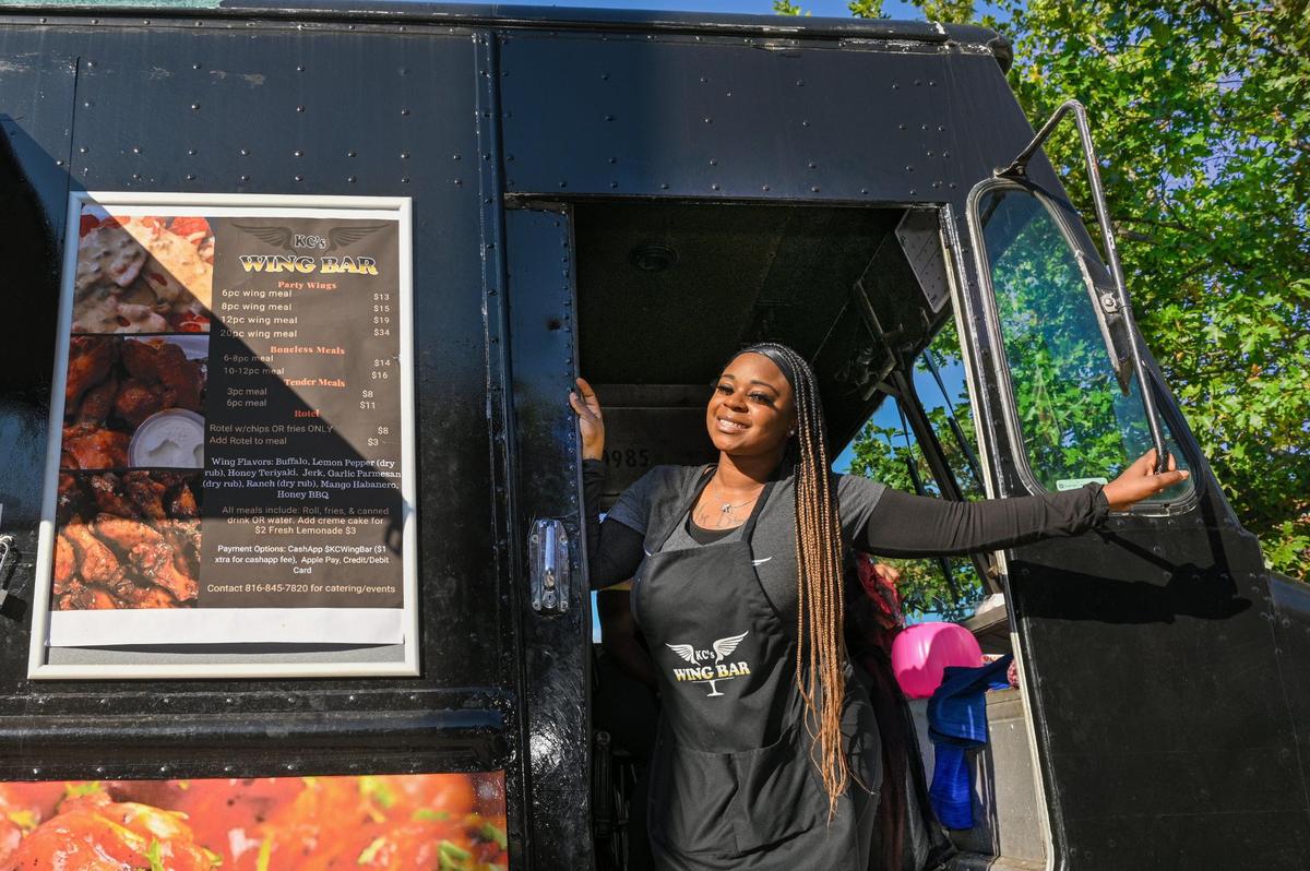 Kay Clark, owner of KC’s Wing Bar food truck, was on hand for a Halloween event in the 18th & Vine District. Clark specializes in chicken wings served with a variety of sauces.