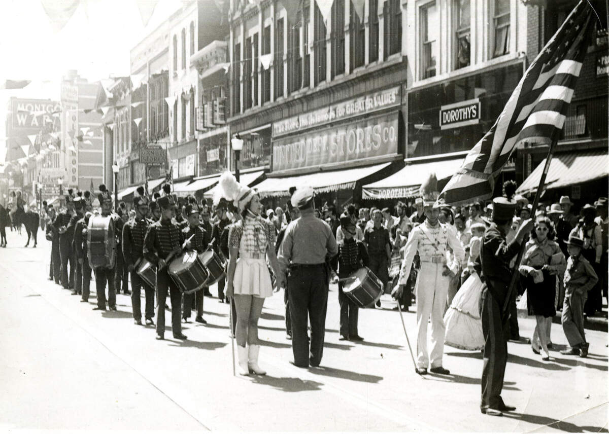 A marching band pauses during the 1949 American Royal Parade.
