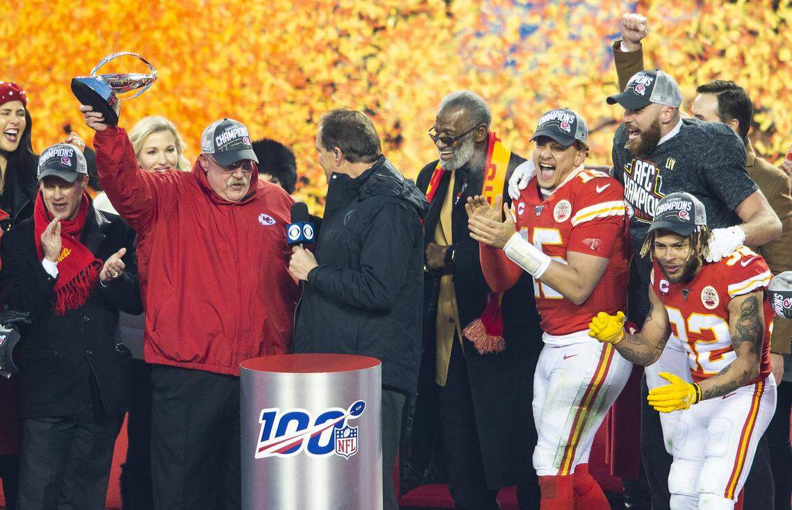 Kansas City Chiefs great Bobby Bell was on stage, wearing a Chiefs scarf, when head coach Andy Reid hoisted the Lamar Hunt AFC Championship trophy over his head after the Chiefs defeated the Tennessee Titans 35-24 at Arrowhead Stadium to take the title and earn a trip to the Super Bowl. On stage with Reid, from left, were CBS announcer Jim Nantz, Bell, Patrick Mahomes, Travis Kelce and Tyrann Mathieu. To Reid’s right is Chiefs owner Clark Hunt.