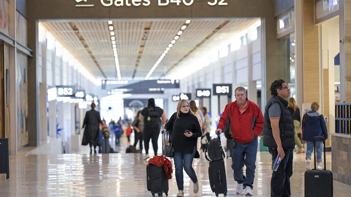 Passengers walked to their departure gates at the new $1.5 billion single terminal at Kansas City International Airport on Tuesday, Feb. 28, 2023.