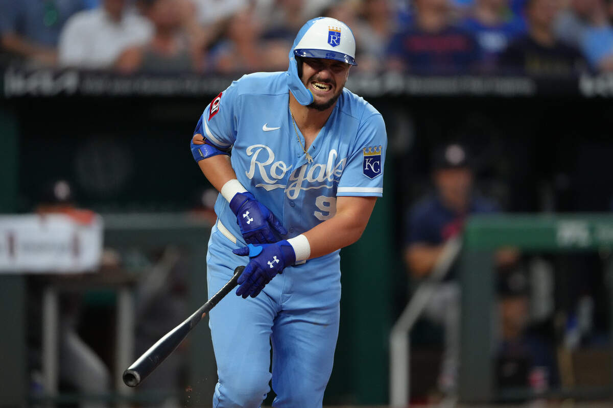 Kansas City Royals first baseman Vinnie Pasquantino reacts as he injuries himself while pop flying out in the fifth inning against the Houston Astros at Kauffman Stadium on June 13, 2026 in Kansas City, Missouri.