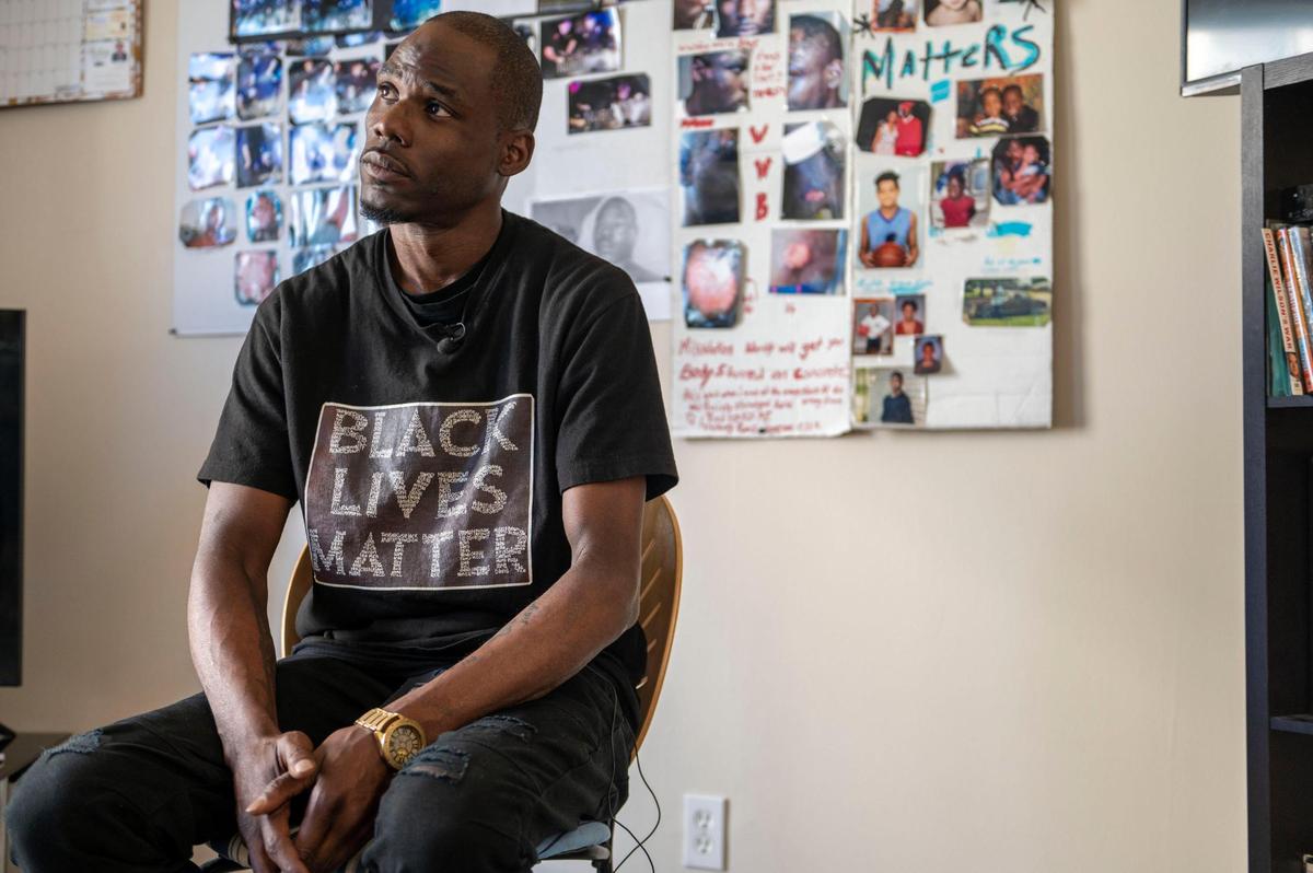 Justin Layton speaks about his experience with the Independence Police Department at his home in Kansas City on Tuesday, March 15, 2022. Layton claims the police violated his civil rights when they arrested him for “jaywalking” two years ago in Independence.