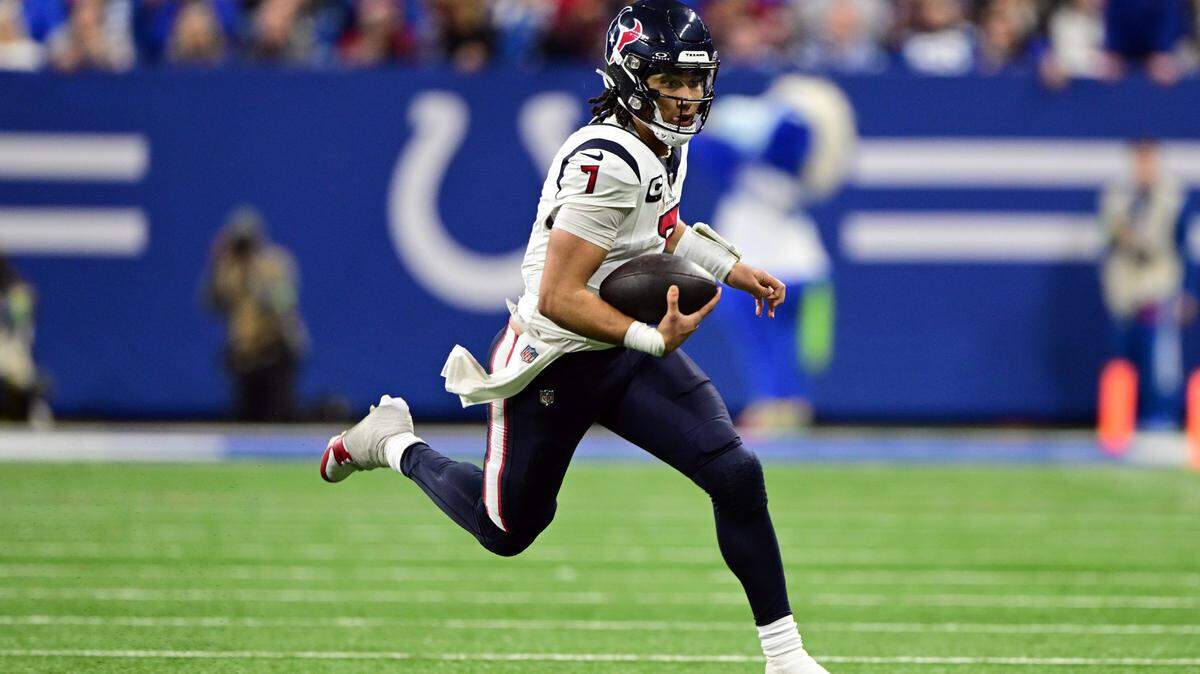 Houston Texans quarterback C.J. Stroud ran the ball against the Indianapolis Colts during the second half at Lucas Oil Stadium on Saturday night.
