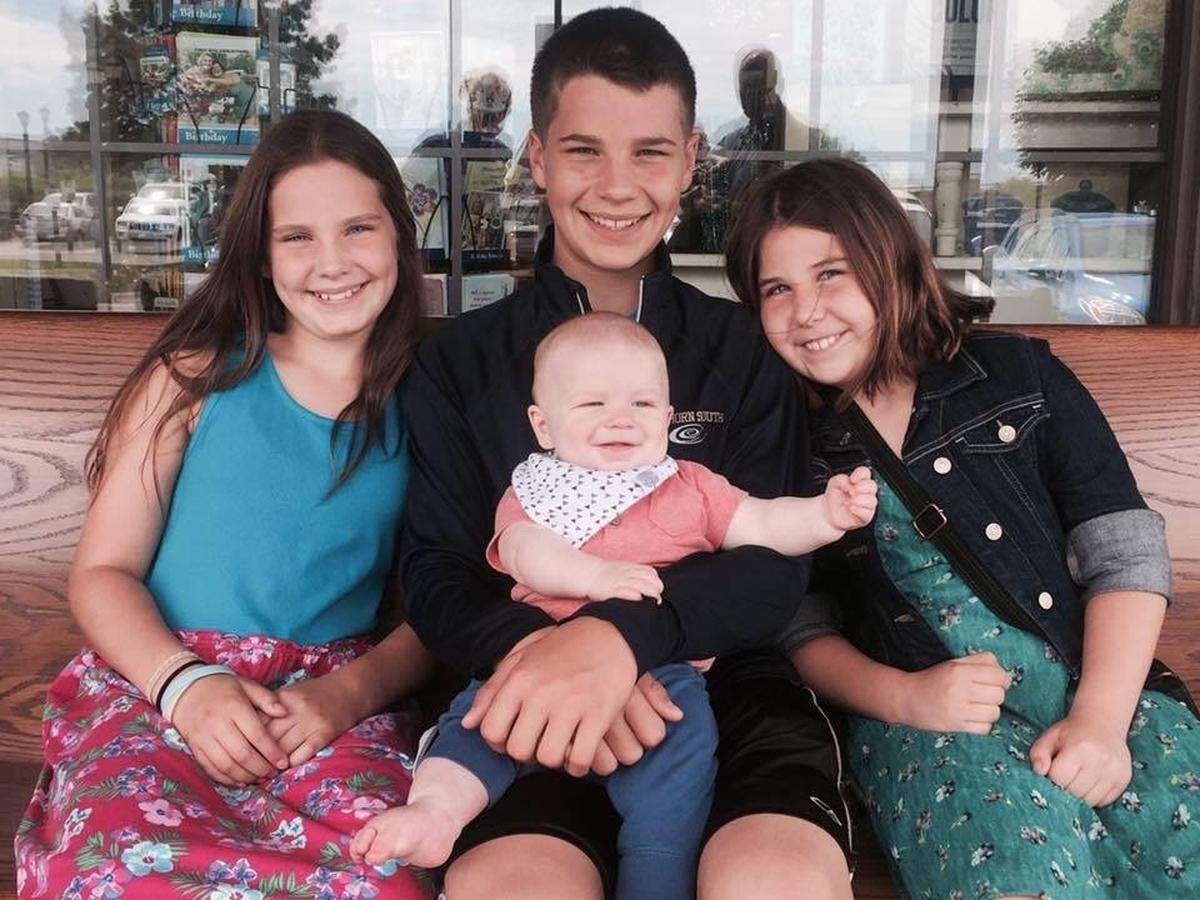 A childhood photo from eight years ago of Elsa McGrain ( left) with her siblings Luke McGrain (Center), Kyra McGrain (right) and their youngest brother Wolf McGrain (center forward)