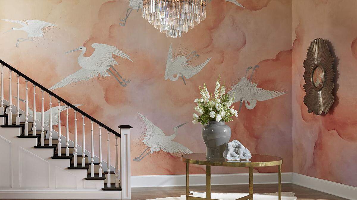 The Phillip Jeffries Spring 2019 collection features Flight, a line of wallcoverings that features cranes against a background of swirling clouds. The Sunrise color evokes Pantone’s Color of the Year, Living Coral.