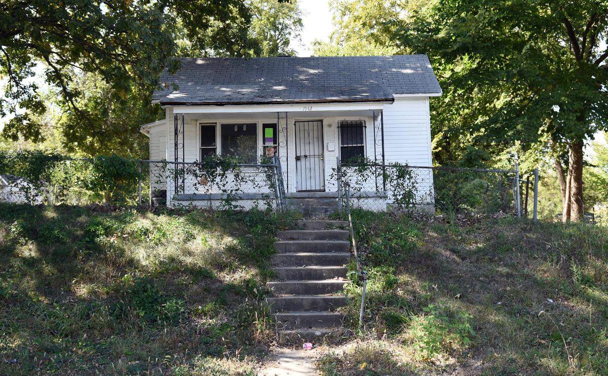 The home where Cecil Brooks was arrested in 2008 in Kansas City, Kansas. The house is now vacant, with a notice from the city calling it unfit for “human habitation.”