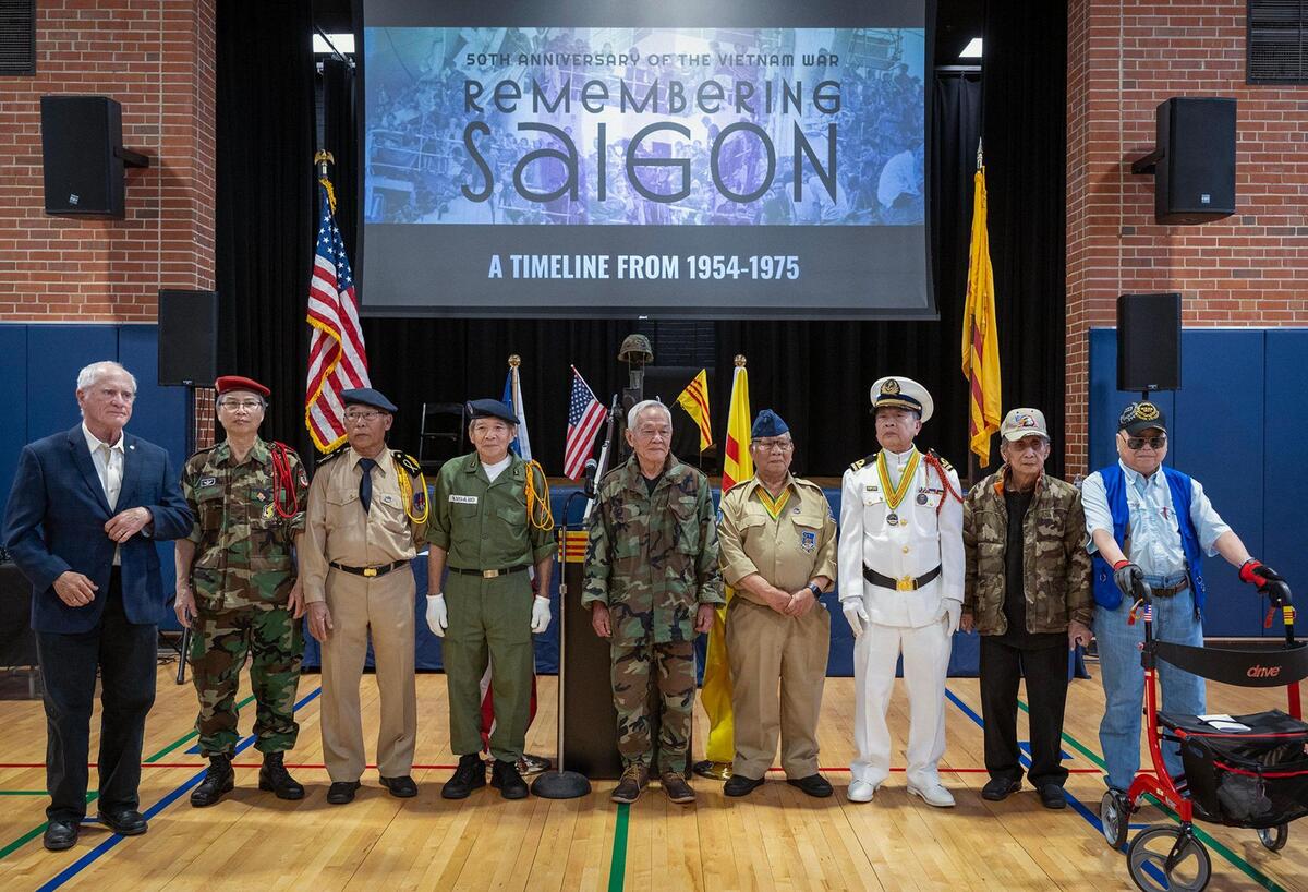 A U.S. veteran, left, shared the stage with veterans from South Vietnam for recognition. Sponsorship for the remembrance was provided by the Vietnamese American Community of Greater Kansas City and Hella Good Deeds.