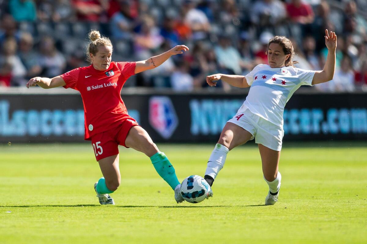 KC Current forward Kristen Hamilton, left, chases down the ball against Chicago Red Stars midfielder Alyssa Mautz during an NWSL Challenge Cup match on Sunday at Children’s Mercy Park in Kansas City, Kansas.