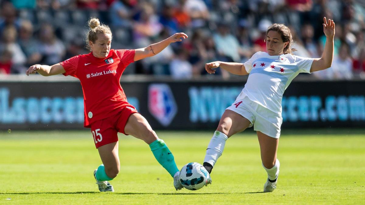 KC Current forward Kristen Hamilton, left, chases down a ball against Chicago Red Stars midfielder Alyssa Mautz during an NWSL Challenge Cup match earlier this year on Sunday at Children’s Mercy Park in Kansas City, Kansas.