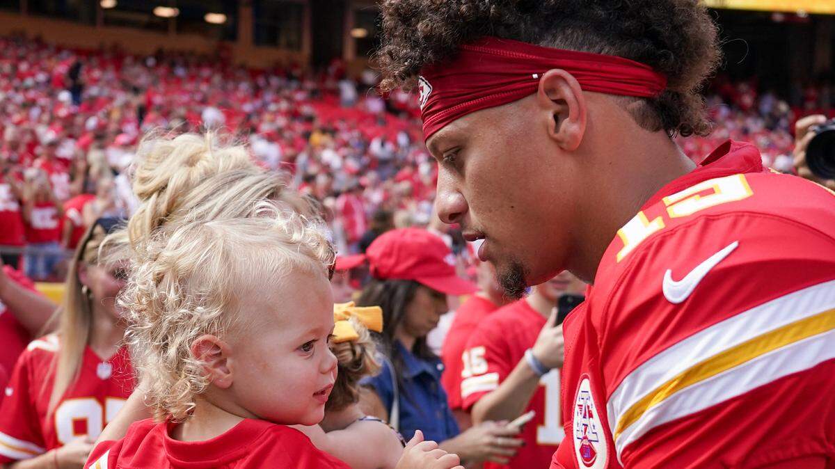 Bronze Mahomes, seen here with his dad, Chiefs quarterback Patrick Mahomes, got a sweet new ride from Santa for Christmas this year.
