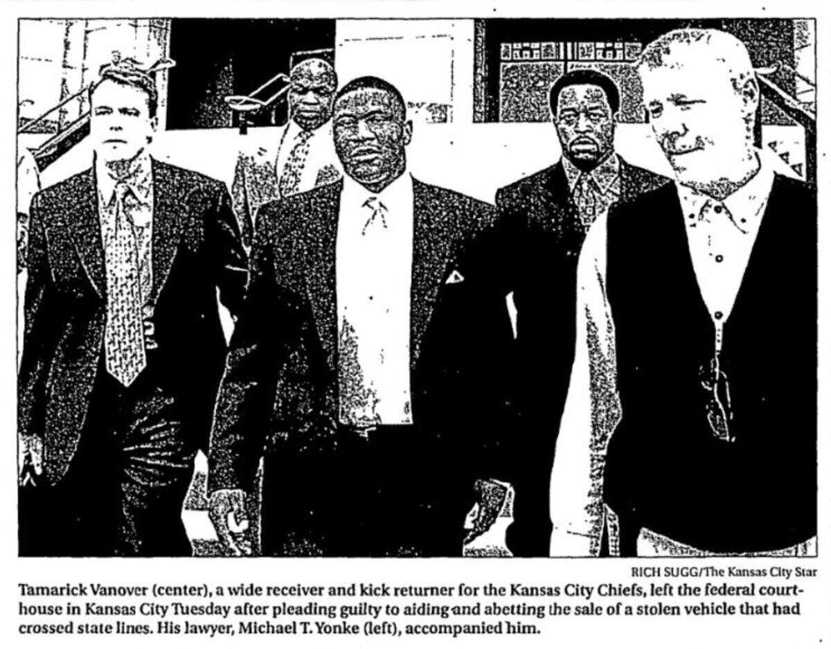 In February 2000, Tamarick Vanover (center), a wide receiver and kick returner for the Kansas City Chiefs, left the federal courthouse in Kansas City after pleading guilty to aiding and abetting the sale of a stolen vehicle that had crossed state lines.