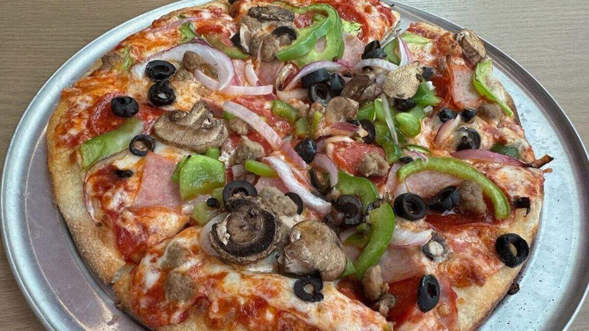 Peter Piper Pizzeria’s The Werx with pepperoni, mushrooms, ham, beef, green peppers, black olives and red onions.