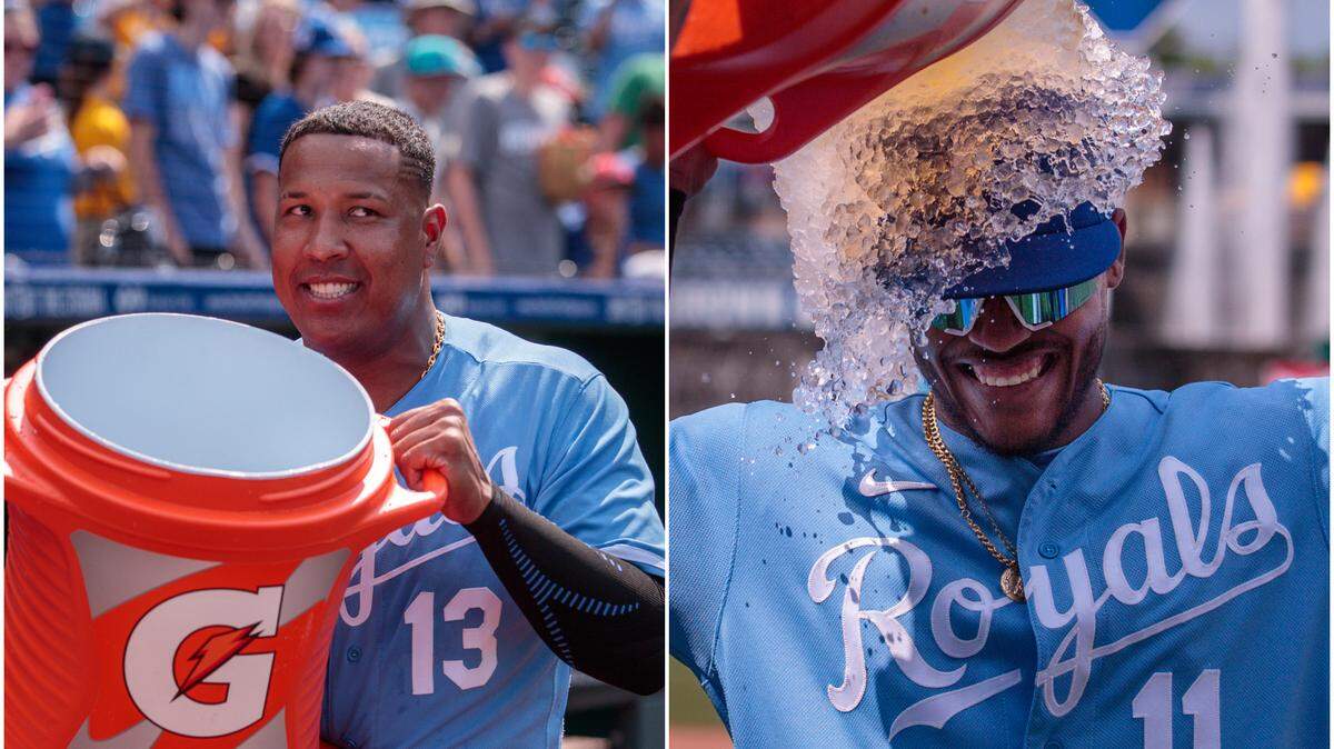 Kansas City Royals third baseman Maikel Garcia (right) gets a postgame Gatorade bath from Royals catcher Salvador Perez (left) at Kauffman Stadium on June 4, 2023.