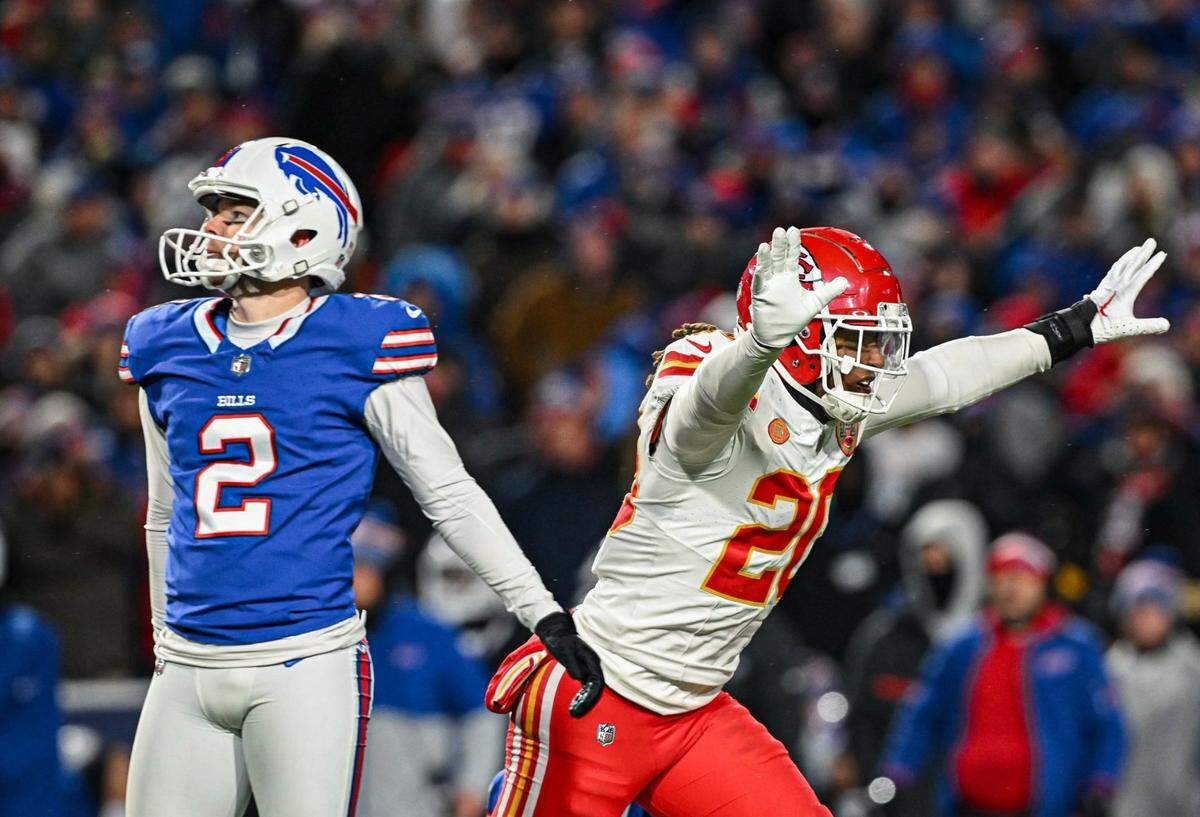 Kansas City Chiefs safety Justin Reid (20) celebrates as Buffalo Bills place kicker Tyler Bass (2) watches his fourth quarter field goal attempt sail wide right Sunday, Jan. 21, 2024, at Highmark Stadium in Orchard Park, New York.