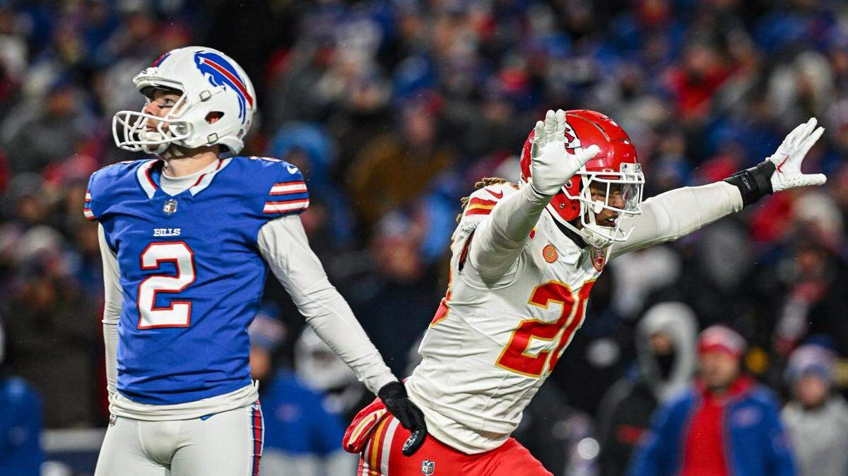 Kansas City Chiefs safety Justin Reid (20) celebrates as Buffalo Bills place kicker Tyler Bass (2) watches his fourth quarter field goal attempt sail wide right Sunday, Jan. 21, 2024, at Highmark Stadium in Orchard Park, New York.