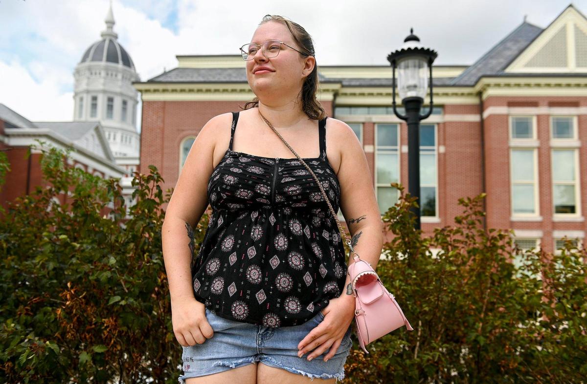 Madison May walks the campus of the University of Missouri-Columbia before her classes begin. May is an animal science major and had a couple of zoo internships delayed by the pandemic, threatening her chances of graduating on time.