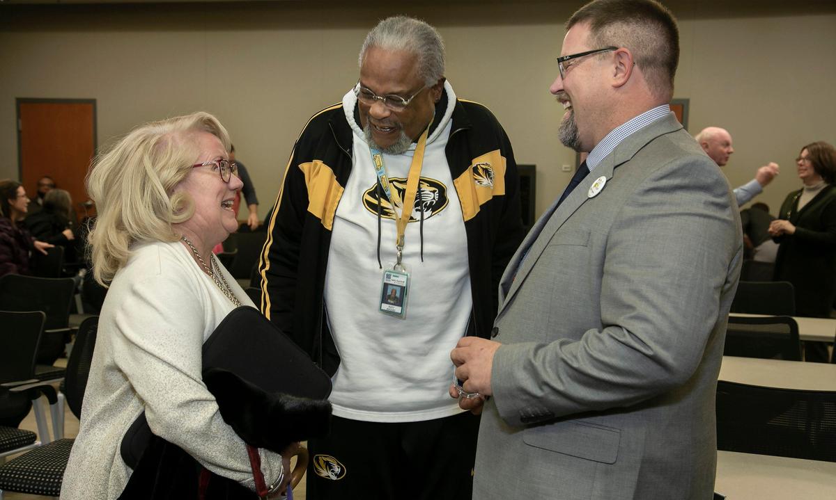 David Buck, the new superintendent of the Lee’s Summit school district, was welcomed this week by the school district’s board. He chatted before a public meeting at the Stansberry Leadership Center with board member Jacqueline Clark and Rudy Rhodes, a district bus driver.