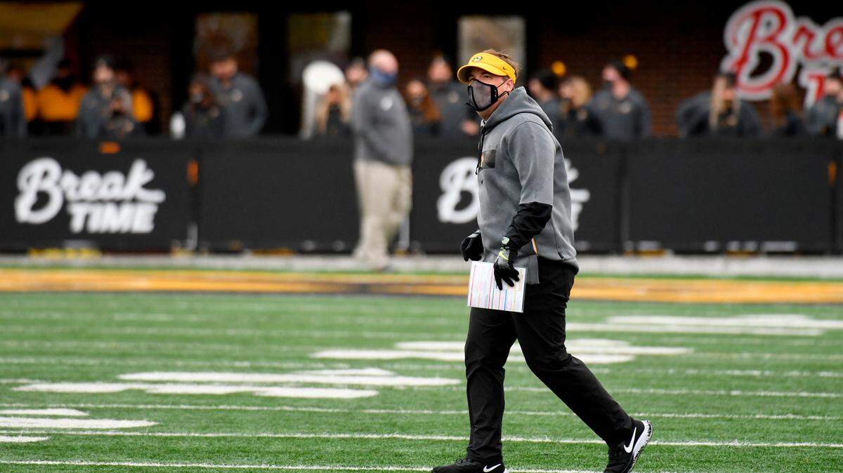 Missouri head coach Eliah Drinkwitz looks up at the scoreboard as time expires in an NCAA college football game against Georgia Saturday, Dec. 12, 2020, in Columbia, Mo. Georgia won 49-14. (AP Photo/L.G. Patterson)