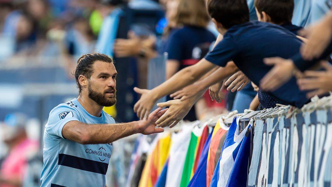 Sporting KC’s Graham Zusi, here greeting fans during last weekend’s home finale at Children’s Mercy Park, made sure that Sunday’s overall season finale didn’t in scoreless for SKC at FC Dallas.
